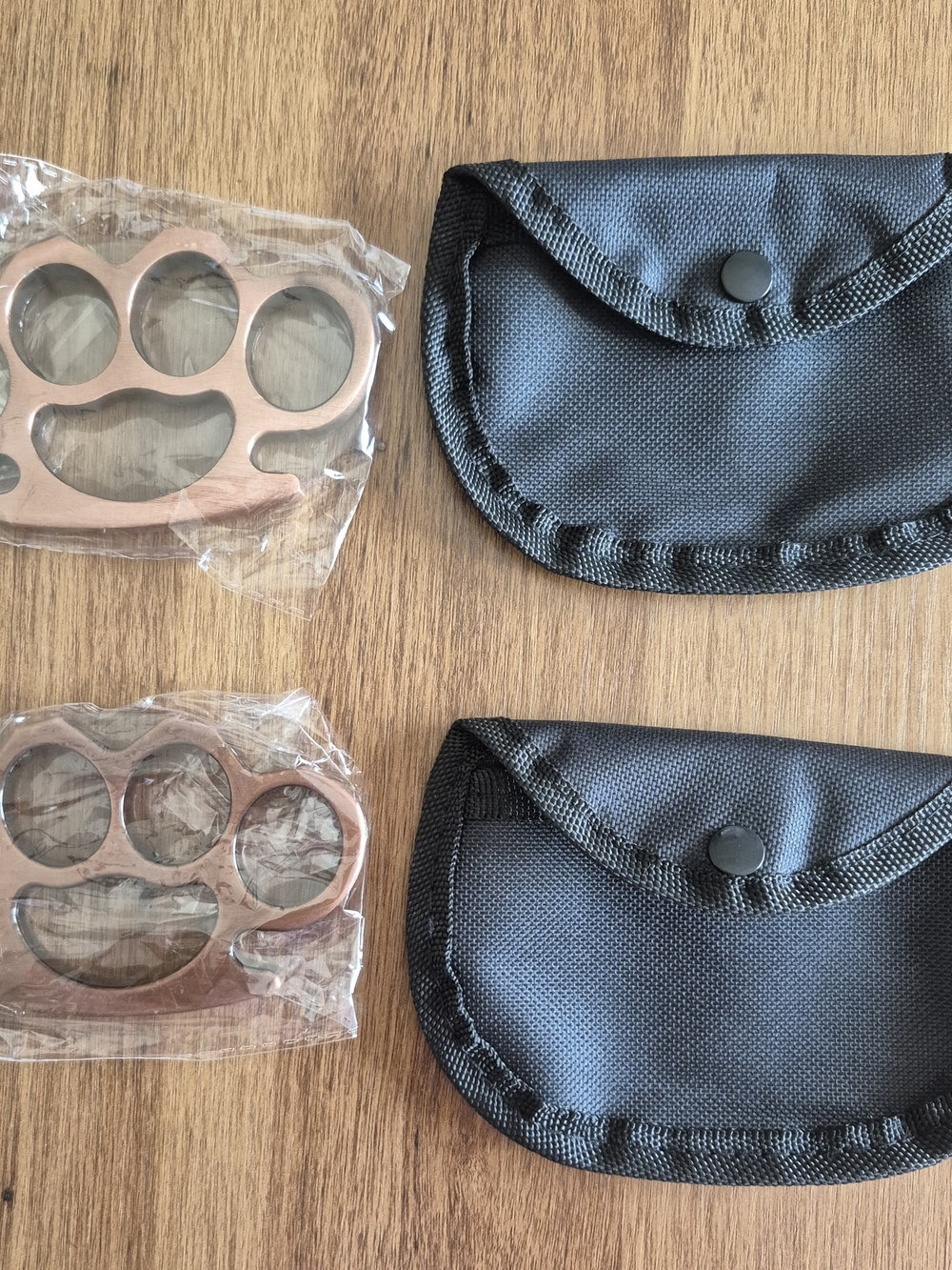 Sleek Bronze Self-Defense Knuckle Set with Pouches